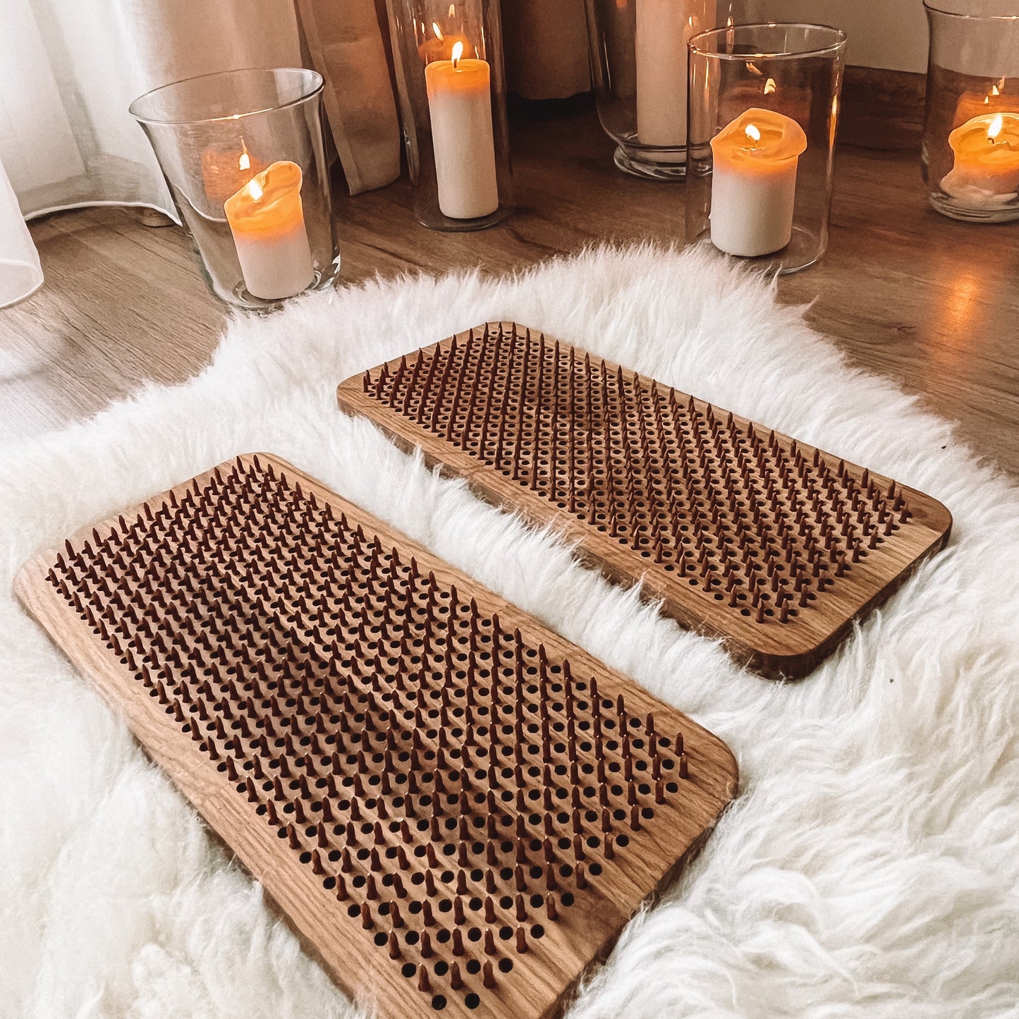 Foot massage practice on the Premium Oak Sadhu Board for reflexology and energy alignment.